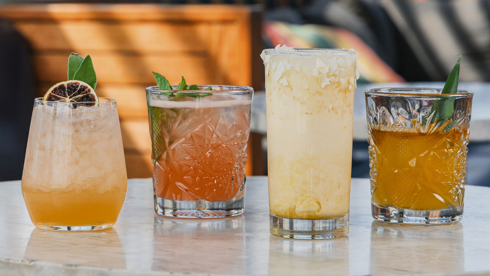 4 cocktails on the bar at The Outsider